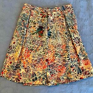 Pleated floral swing skirt with pockets